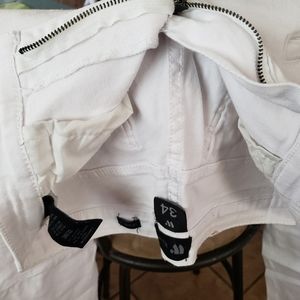 Female white ripped jeans